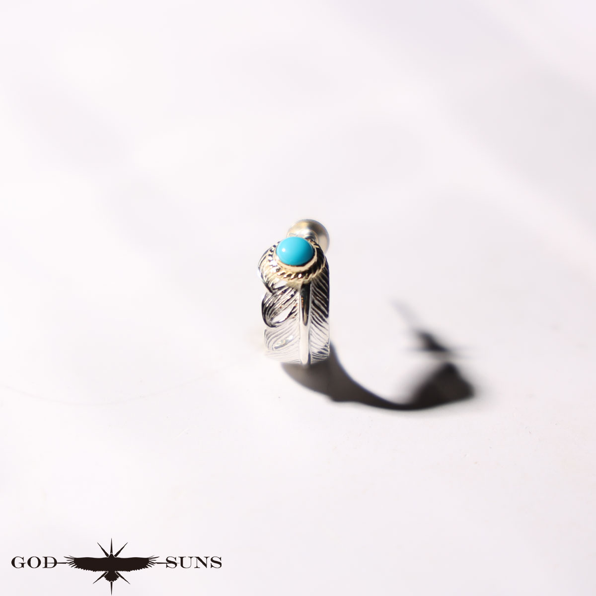 ラウンドフェザーピアス金縄TQ大（左向き） フェザーピアス GOD SUNS